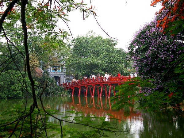 The Huc Bridge - a red silk crossing the green saphire water